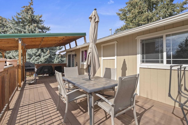 deck with outdoor dining space