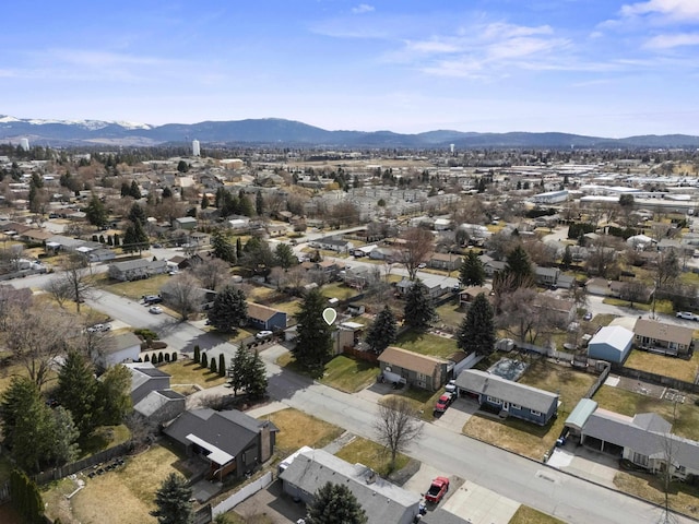 birds eye view of property featuring a mountain view