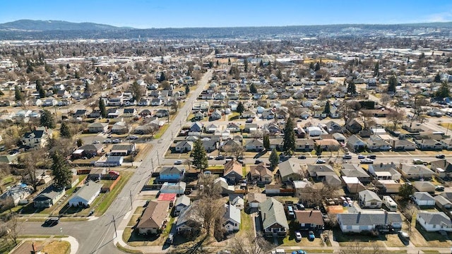 aerial view with a mountain view and a residential view