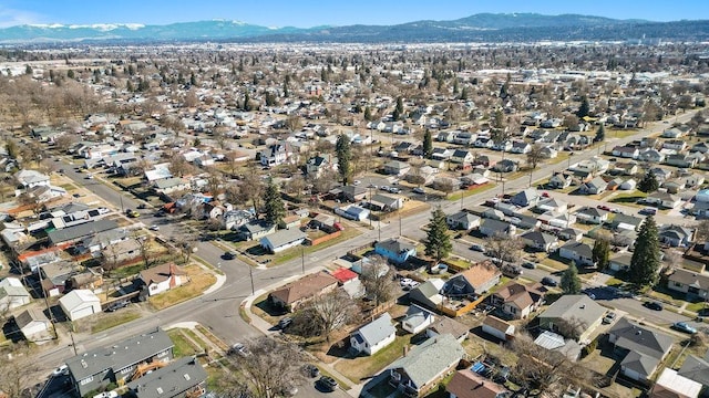 aerial view featuring a mountain view and a residential view