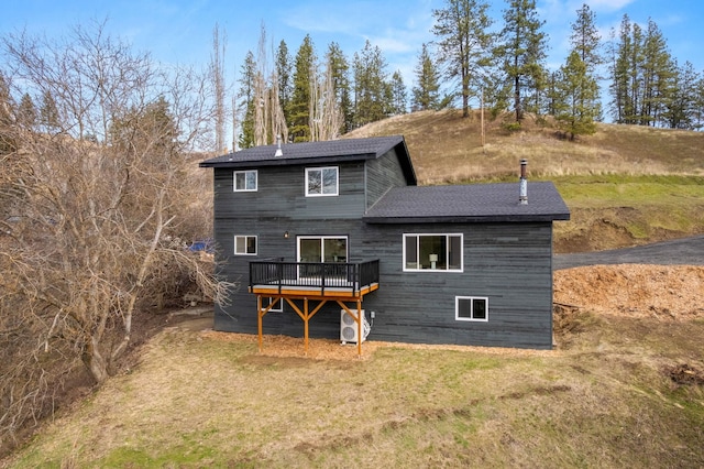 6712 C Highway 291, Nine Mile Falls, WA 99026 - rear view of property featuring a deck, a yard, and roof with shingles