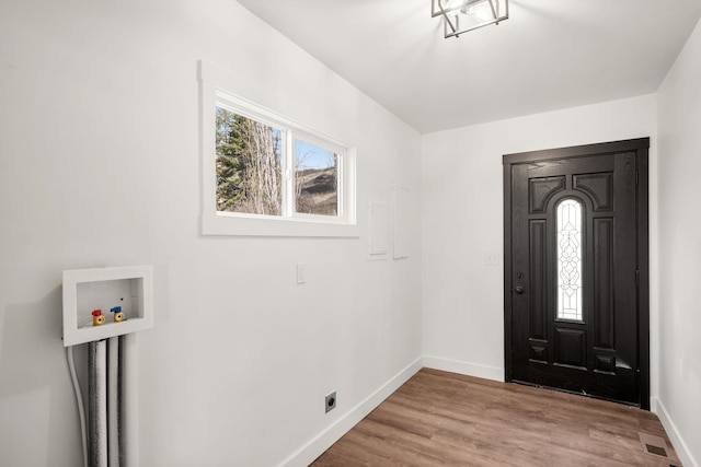 6712 C Highway 291, Nine Mile Falls, WA 99026 - entrance foyer featuring baseboards and light wood-style floors