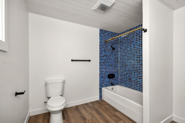 6712 C Highway 291, Nine Mile Falls, WA 99026 - full bath featuring toilet, shower / bathtub combination, wood finished floors, and baseboards