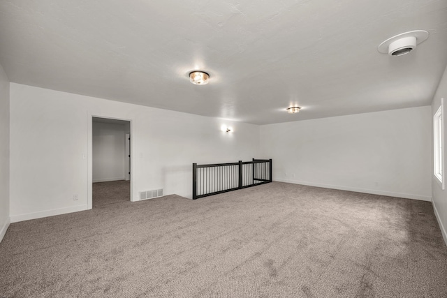 6712 C Highway 291, Nine Mile Falls, WA 99026 - empty room with carpet flooring and baseboards