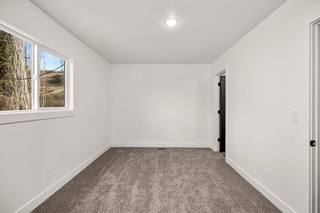 6712 C Highway 291, Nine Mile Falls, WA 99026 - empty room with carpet floors, baseboards, and recessed lighting
