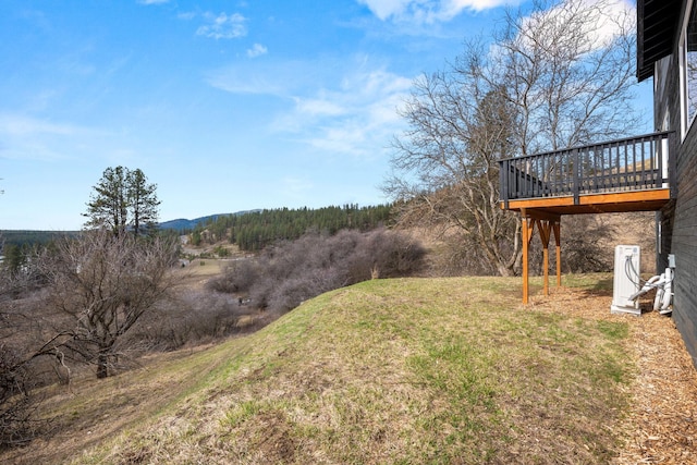 6712 C Highway 291, Nine Mile Falls, WA 99026 - view of grassy yard featuring a wooden deck
