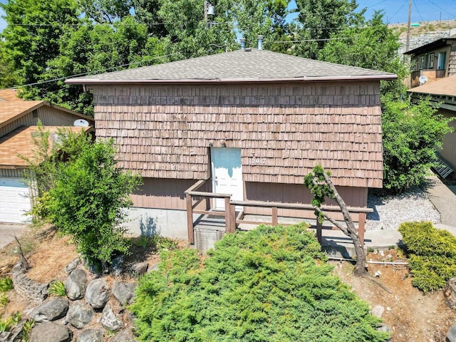 12017 E Mansfield Avenue ., Spokane Valley, WA 99206 - exterior space with a garage