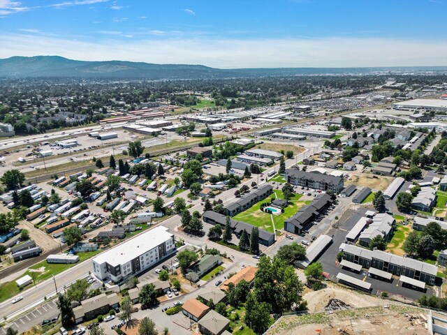 12017 E Mansfield Avenue ., Spokane Valley, WA 99206 - drone / aerial view with a mountain view