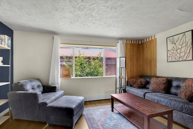 12017 E Mansfield Avenue ., Spokane Valley, WA 99206 - living area featuring a textured ceiling and wood finished floors