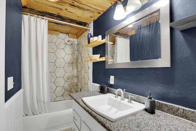 12017 E Mansfield Avenue ., Spokane Valley, WA 99206 - bathroom featuring shower / bath combo with shower curtain, vanity, and a textured wall