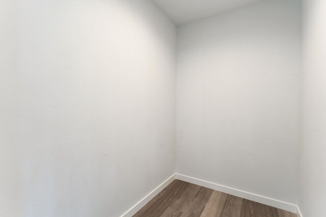 806 W Bolan Ave, Spokane, WA 99224 - empty room featuring baseboards and dark wood-style flooring