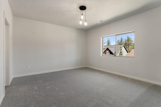 806 W Bolan Ave, Spokane, WA 99224 - carpeted spare room with baseboards