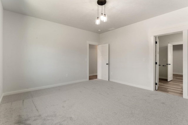 806 W Bolan Ave, Spokane, WA 99224 - empty room featuring carpet floors and baseboards