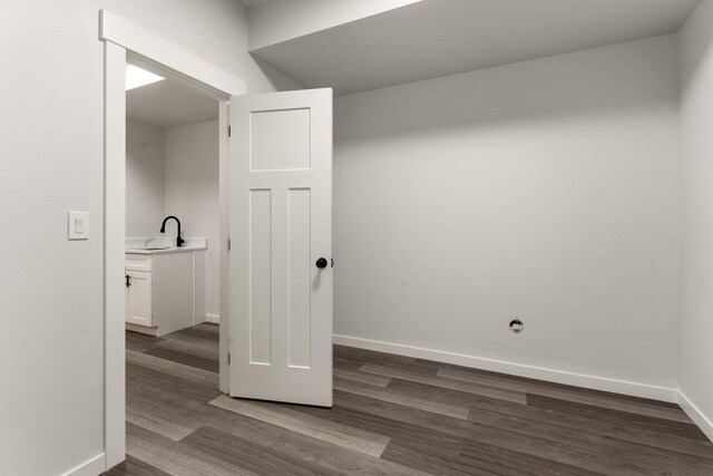 806 W Bolan Ave, Spokane, WA 99224 - interior space with dark wood finished floors, baseboards, and a sink