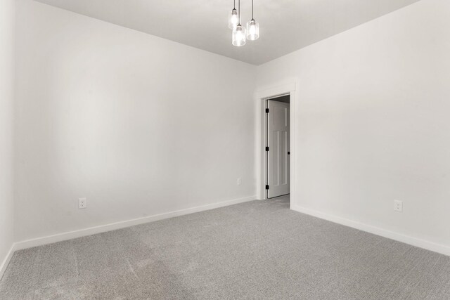 806 W Bolan Ave, Spokane, WA 99224 - carpeted spare room with baseboards