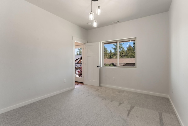 806 W Bolan Ave, Spokane, WA 99224 - spare room with carpet floors and baseboards