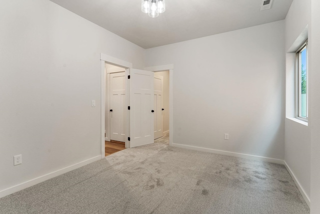 806 W Bolan Ave, Spokane, WA 99224 - spare room featuring carpet floors and baseboards