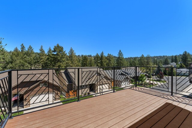 806 W Bolan Ave, Spokane, WA 99224 - wooden terrace with a forest view