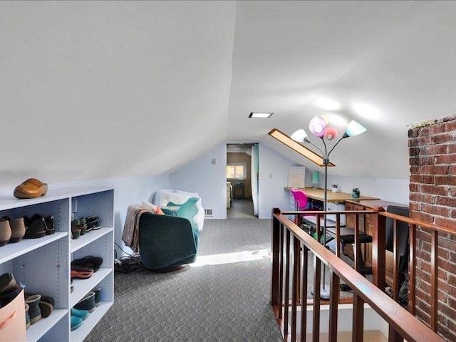 bonus room featuring carpet floors and vaulted ceiling