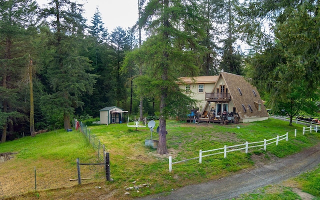 2063-A Marble Valley Basin Rd, Addy, WA 99101 - view of yard with stairs, a wooden deck, and a forest view
