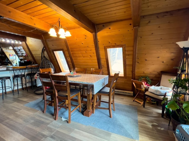 2063-A Marble Valley Basin Rd, Addy, WA 99101 - dining area featuring wood walls, wood finished floors, wood ceiling, and a chandelier