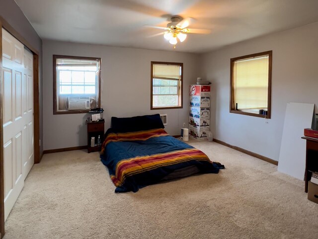 2063-A Marble Valley Basin Rd, Addy, WA 99101 - carpeted bedroom with multiple windows, baseboards, and cooling unit