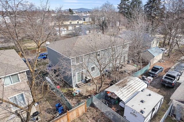 birds eye view of property with a residential view