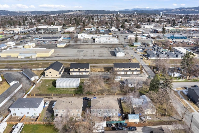 drone / aerial view with a residential view and a mountain view