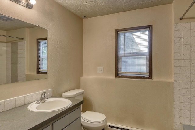 6208 N Wiscomb St, Spokane, WA 99208 - full bath with a shower, vanity, healthy amount of natural light, a textured ceiling, and a textured wall