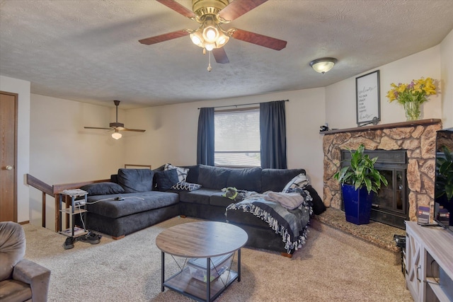 6208 N Wiscomb St, Spokane, WA 99208 - carpeted living area featuring a textured ceiling, a ceiling fan, and a fireplace