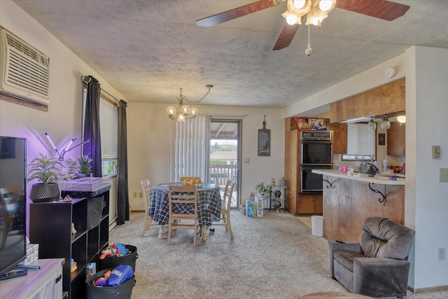6208 N Wiscomb St, Spokane, WA 99208 - dining area with a textured ceiling, a chandelier, light carpet, ceiling fan, and a wall mounted AC