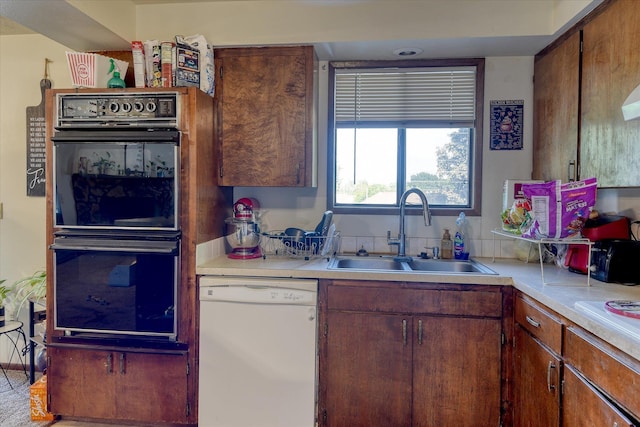 6208 N Wiscomb St, Spokane, WA 99208 - kitchen with white dishwasher and light countertops