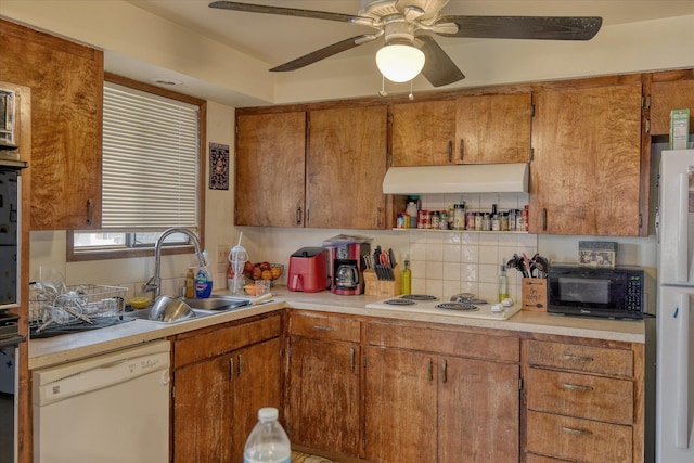 6208 N Wiscomb St, Spokane, WA 99208 - kitchen featuring white appliances, premium range hood, backsplash, and light countertops