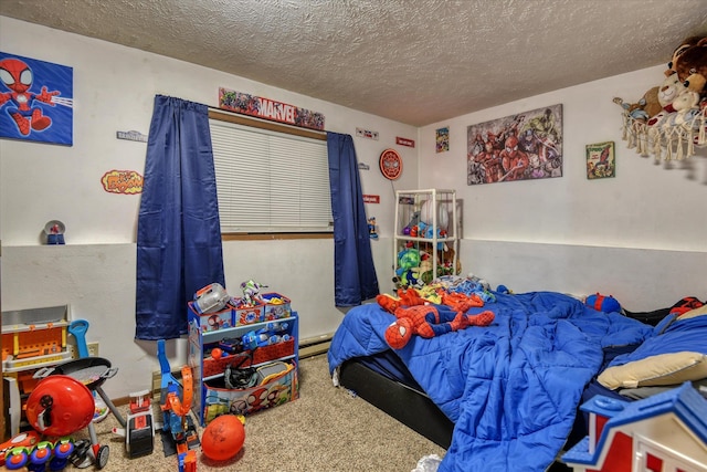 6208 N Wiscomb St, Spokane, WA 99208 - bedroom with carpet flooring, a textured ceiling, and baseboard heating