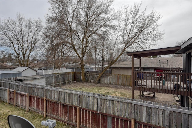 6208 N Wiscomb St, Spokane, WA 99208 - fenced backyard with a deck