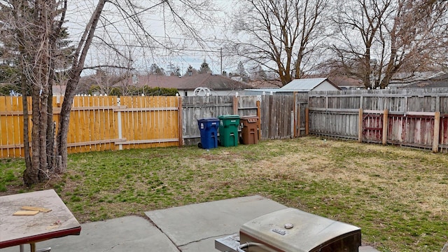 6208 N Wiscomb St, Spokane, WA 99208 - fenced backyard featuring a patio