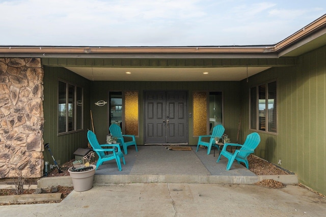 313 SE Trinity Ave, Wilbur, WA 99185 - doorway to property with a porch and stone siding