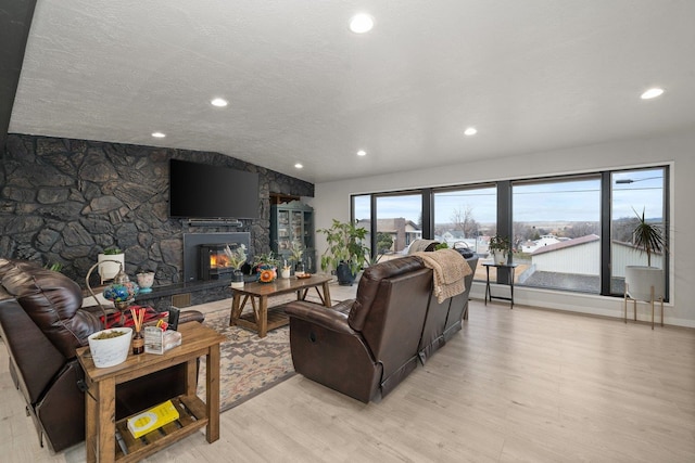 313 SE Trinity Ave, Wilbur, WA 99185 - living room featuring light wood-style floors, a fireplace, and recessed lighting