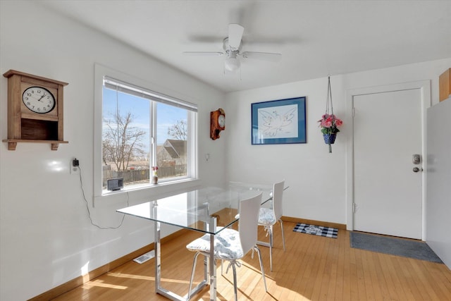870 E 8th Ave, Colville, WA 99114 - dining room with visible vents, baseboards, ceiling fan, and hardwood / wood-style floors