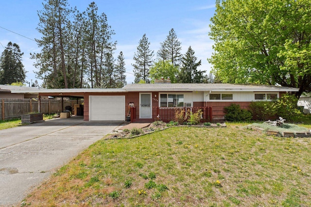 1804 S Blake Rd, Spokane Valley, WA 99216 - single story home with fence, an attached garage, a front lawn, concrete driveway, and a carport