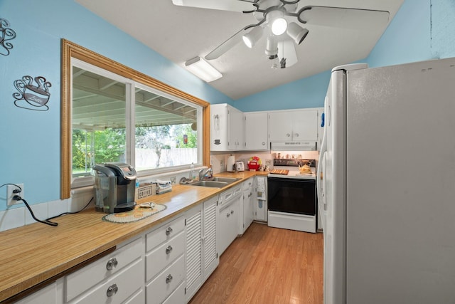1804 S Blake Rd, Spokane Valley, WA 99216 - kitchen with a sink, white appliances, light countertops, lofted ceiling, and under cabinet range hood
