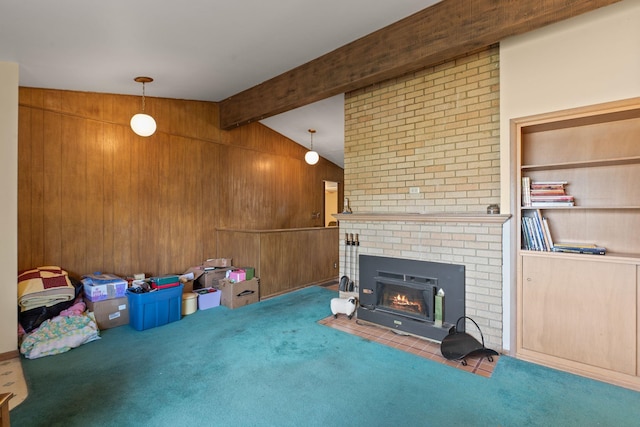 1804 S Blake Rd, Spokane Valley, WA 99216 - unfurnished living room featuring carpet floors, wood walls, lofted ceiling with beams, and a brick fireplace