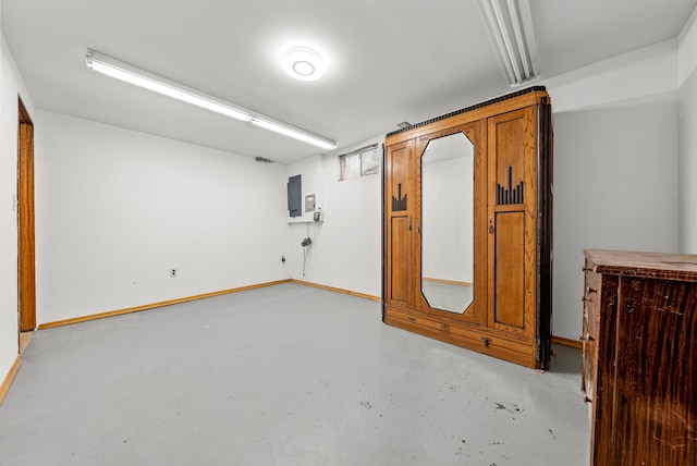 147 N Lindsey St, Tekoa, WA 99033 - empty room with baseboards and finished concrete floors