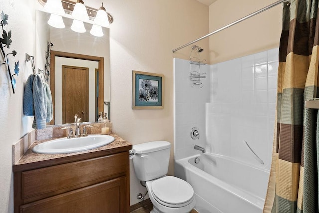 bathroom with toilet, shower / tub combo with curtain, and vanity