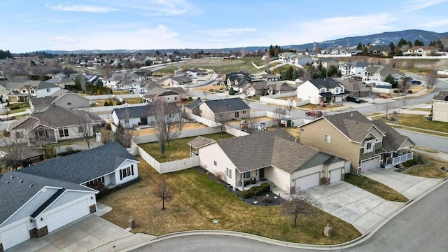 bird's eye view with a residential view and a mountain view