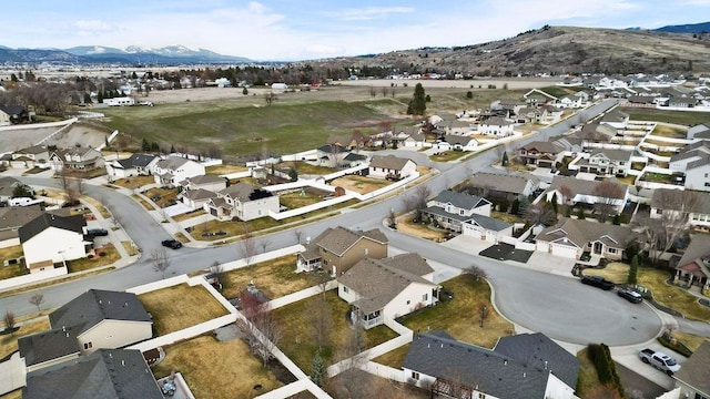 bird's eye view featuring a residential view and a mountain view