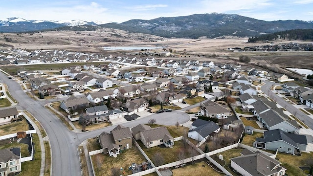birds eye view of property featuring a residential view and a mountain view