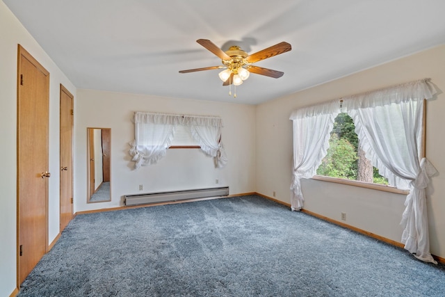 1791 S Leclerc Rd, Newport, WA 99156 - carpeted empty room featuring baseboard heating, a ceiling fan, and baseboards