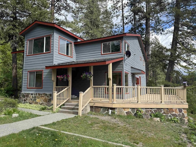 1791 S Leclerc Rd, Newport, WA 99156 - view of front facade with covered porch and stone siding