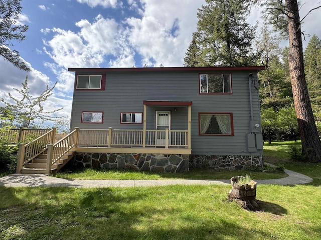 1791 S Leclerc Rd, Newport, WA 99156 - rear view of property featuring a yard and a wooden deck